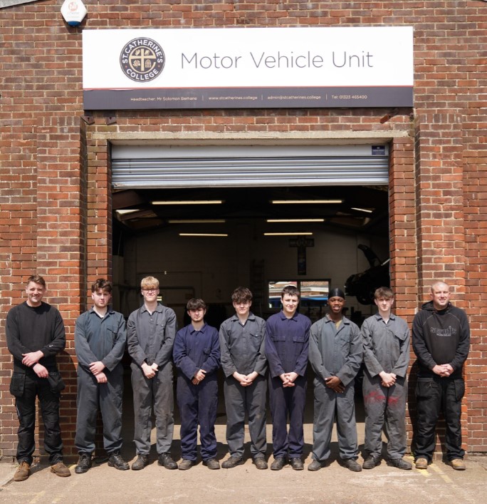 Students outside the motor vehicle unit