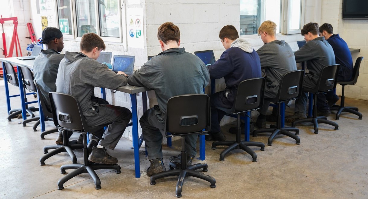 Students outside the motor vehicle unit